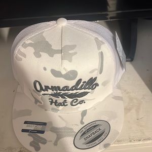 This is armadillo hat it’s all white and it’s in very good condition